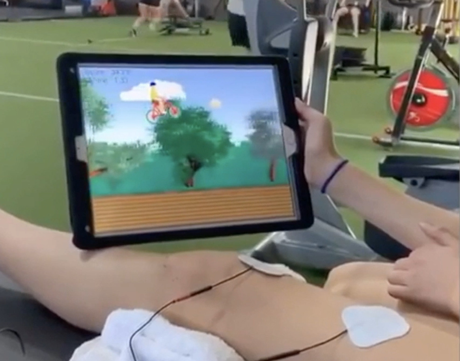 Patient plays mTrigger Trailblazer on quad